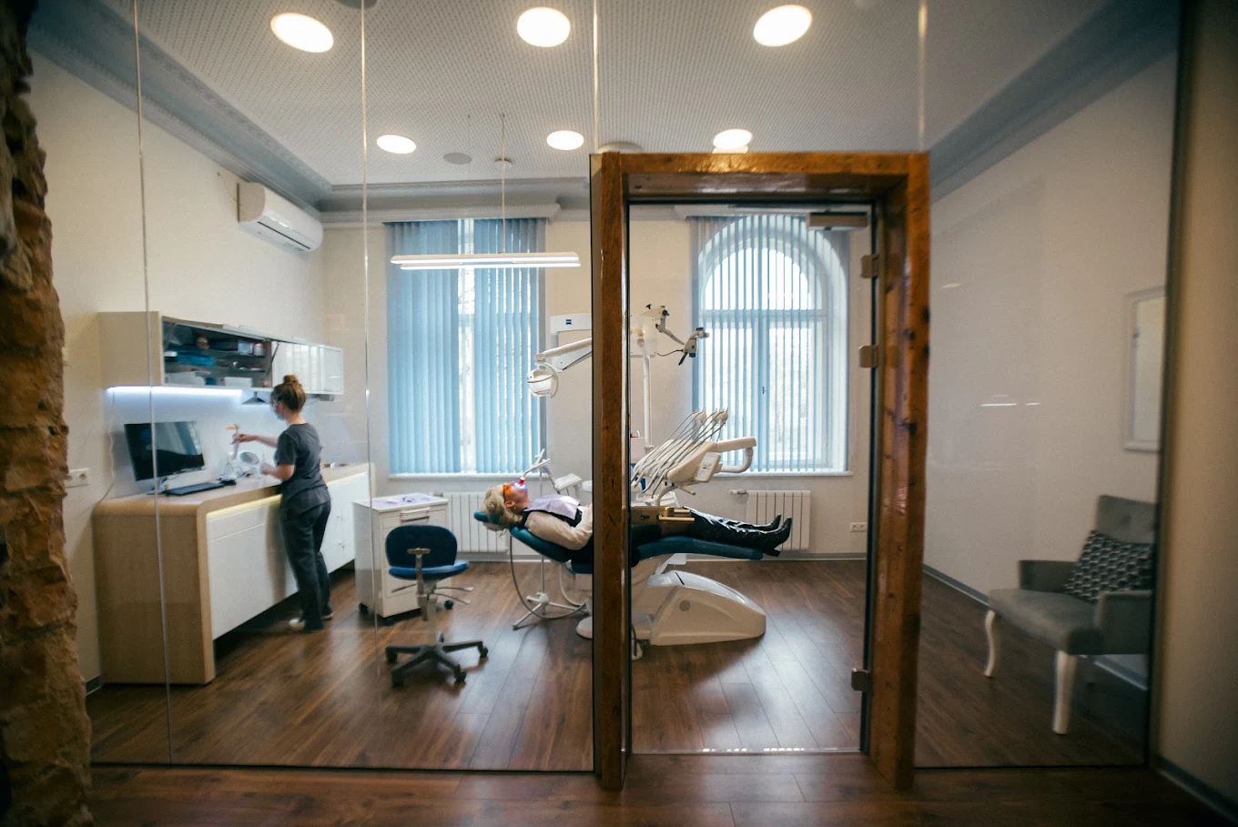 Modern treatment room with patient receiving care